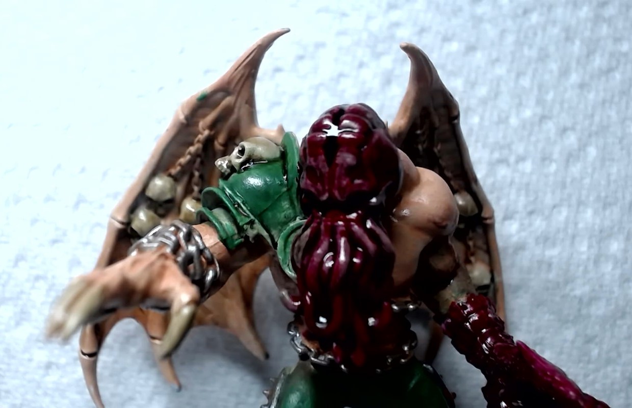 Bête de Nurgle tête rouge, peau bronzé et armure verte